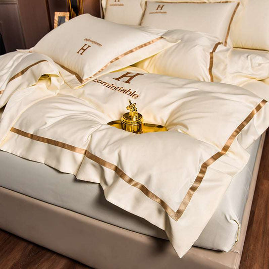 Home Fashion Simple Ice Silk Bed Sheet Covers Four-Piece Set – Luxurious and Minimalist